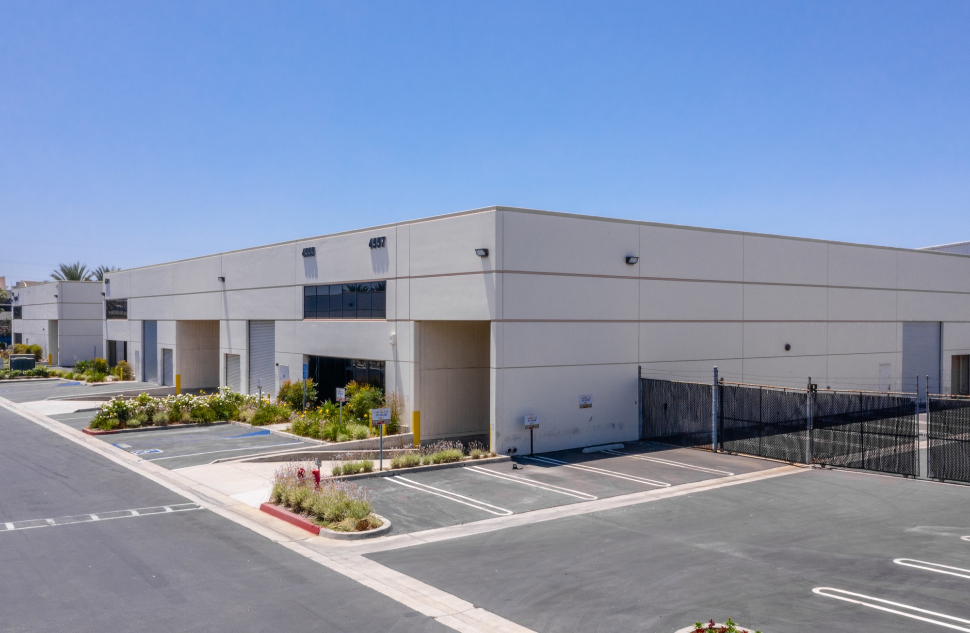 4555 and 4557 Firestone Blvd corner elevation and secured yard